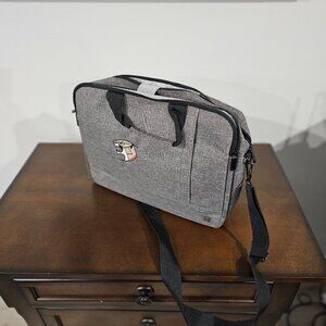 Kapston Laptop Bag Grey in color Black should strap Lion head embroidered